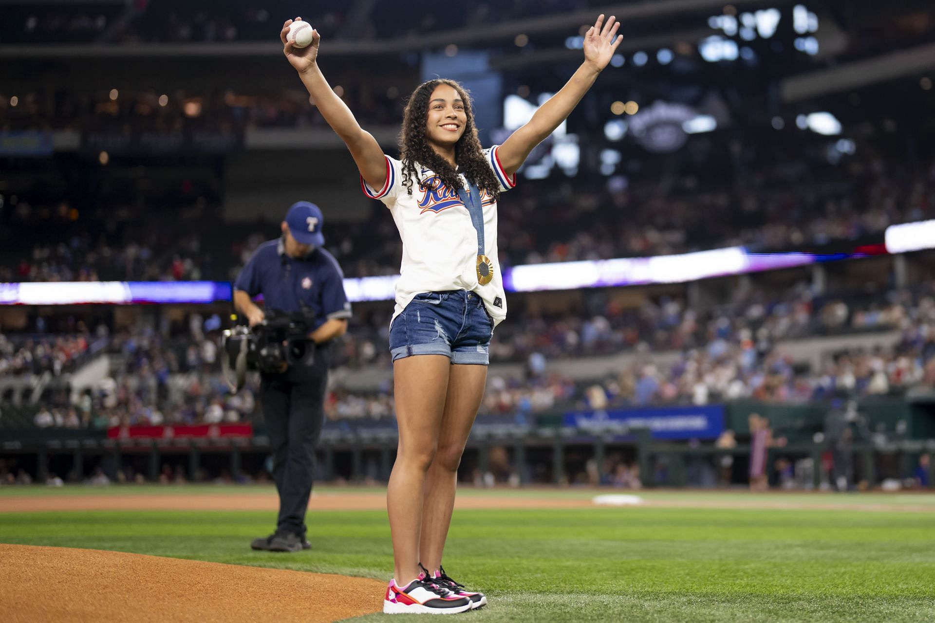 Hezly Rivera throws the first pitch ahead of the New York Yankees v Texas Rangers game - Source: Getty